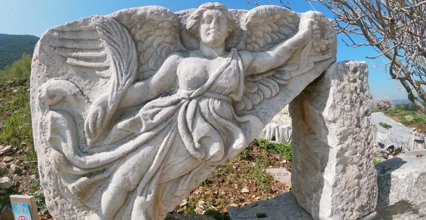 Stone relief of the winged goddess Nike at Ephesus